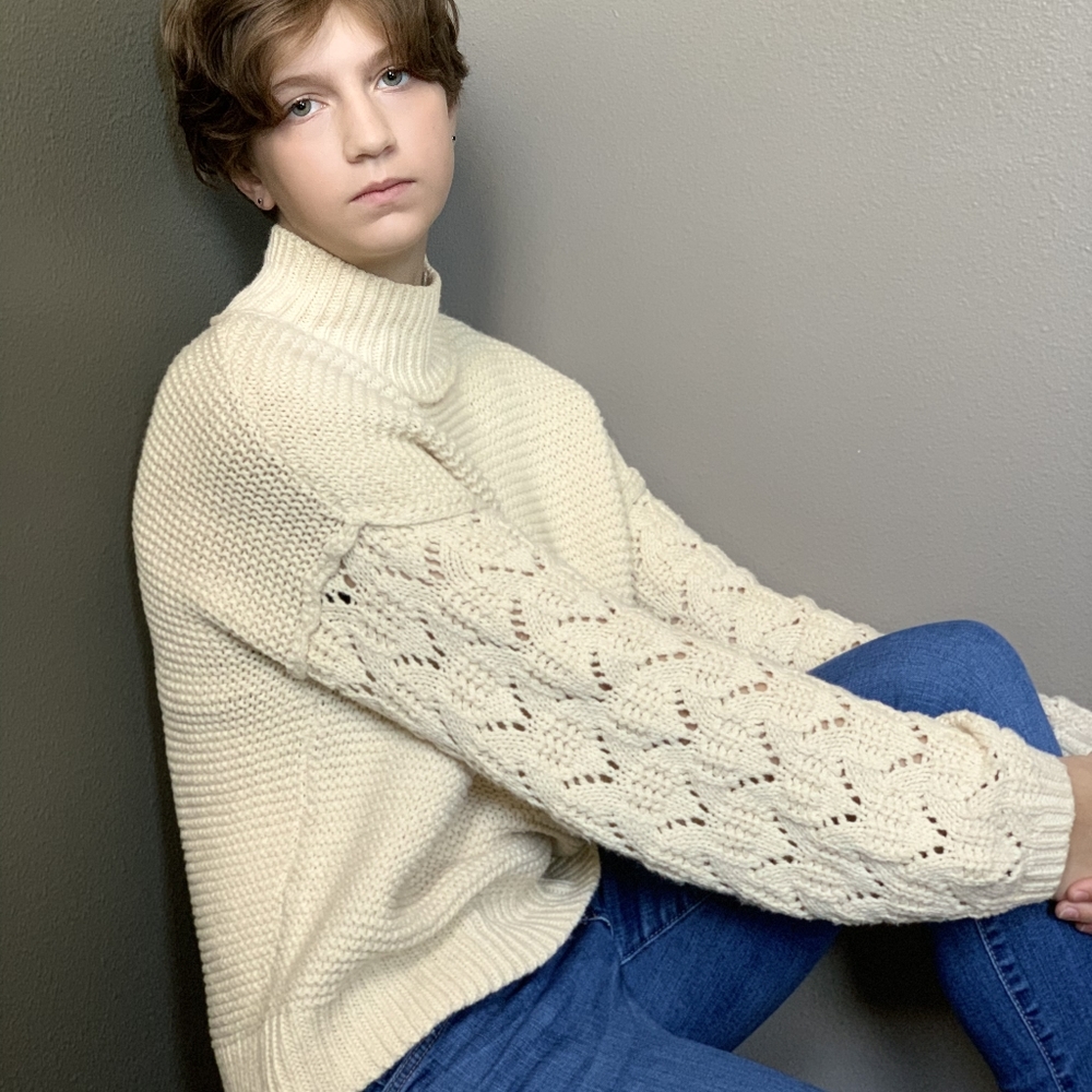 Universal thread cream sweater